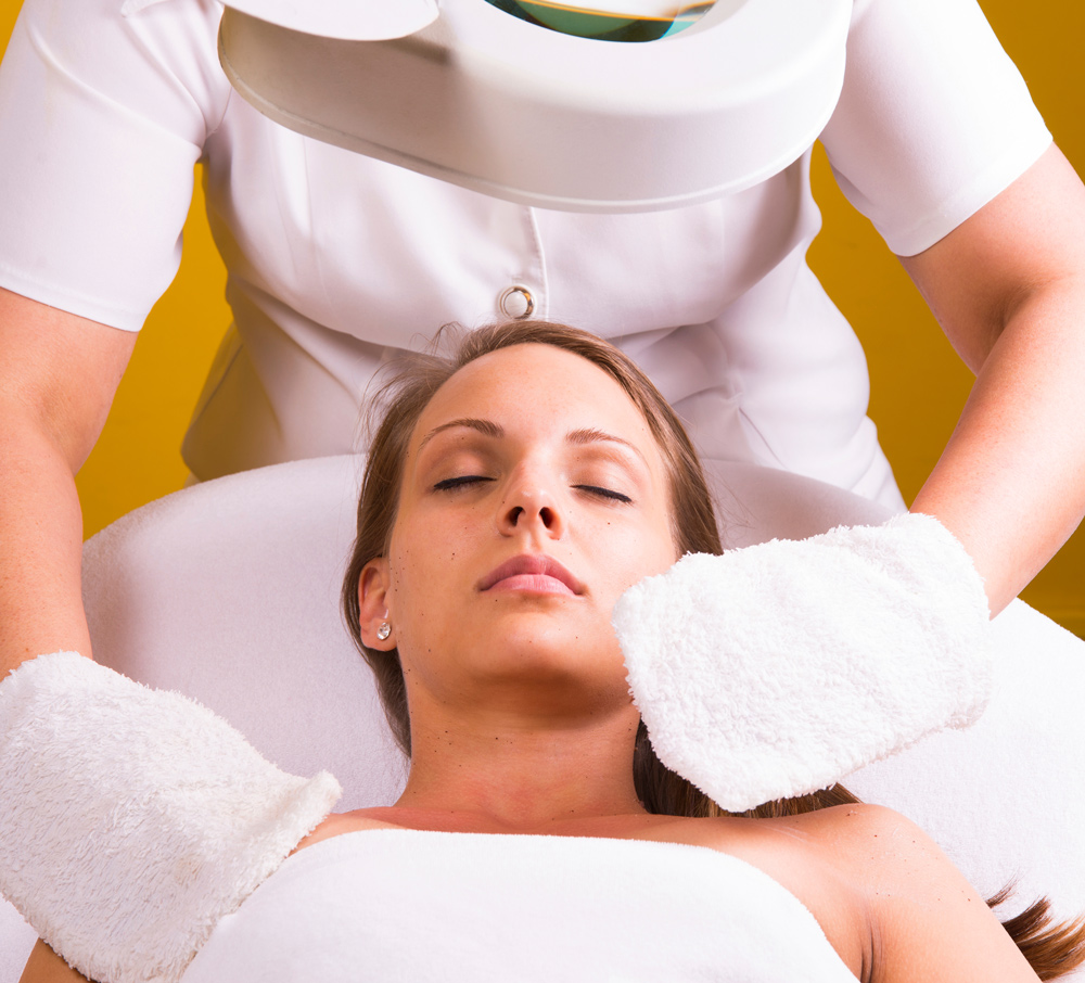 facials services on woman at spa