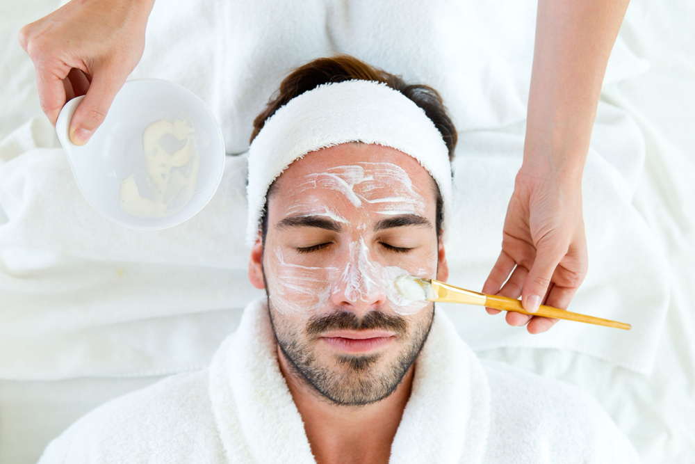 man receiving fire and ice facial
